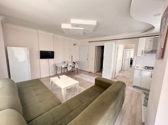 TRAMVAY DURAĞINDA EŞYALI 1+1 SATILIK DAİRE