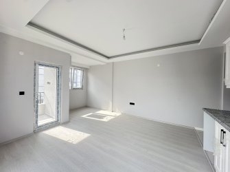 %80 İNE KREDİLİ ARA KAT SIFIR BALKONLU 1+1 DAİRE